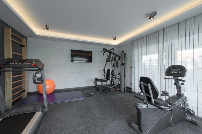 Integrated-AV-Installation-in-Home-Gym Turbocharge Your Workouts With a Home Automation Installation for a Fitter, Smarter 2018